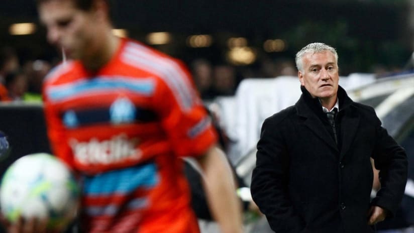 Didier Deschamps, a former Juventus and Chelsea midfielder as well as  ex-captain of the French team, waves during his official presentation as  new coach of Juventus soccer club, in Acqui Terme training