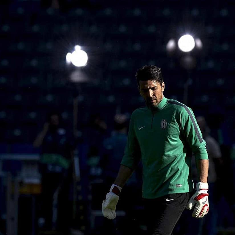 Buffon penalty heroics bag Italy a point